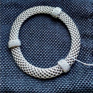 Sterling silver marked 925 stretchable woven bracelet
EUC​   FIRM
